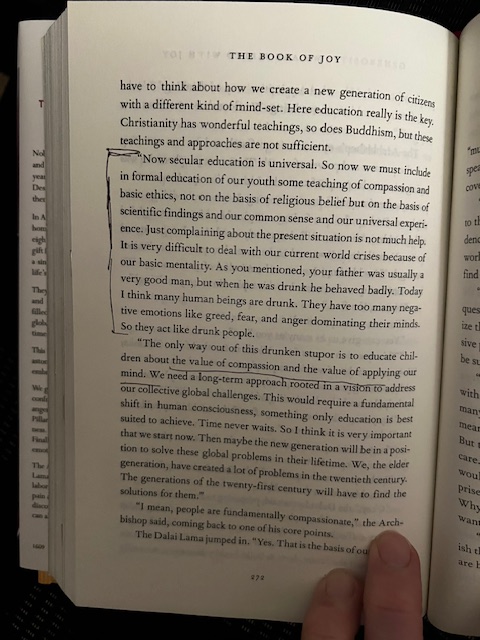 Picture of page 272 in The Book of Joy, which talks about how education should be updated to include teachings on compassion and ethics based on common sense, scientific findings, and universal experience. 