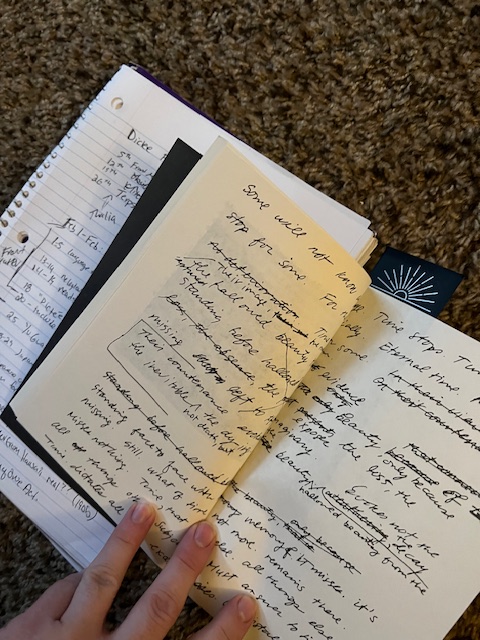 Picture of handwritten pages at the end of "Clio," in Theresa Hak Kyung Cha's book, Dictee, sitting atop notebook with reading notes. 