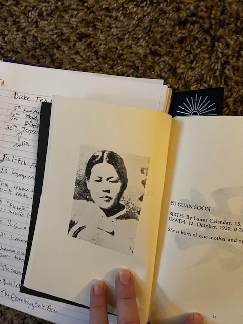 Picture of Yu Guan Soon with biographical information, in Theresa Hak Kyung Cha's book, Dictee, sitting atop notebook with reading notes. 